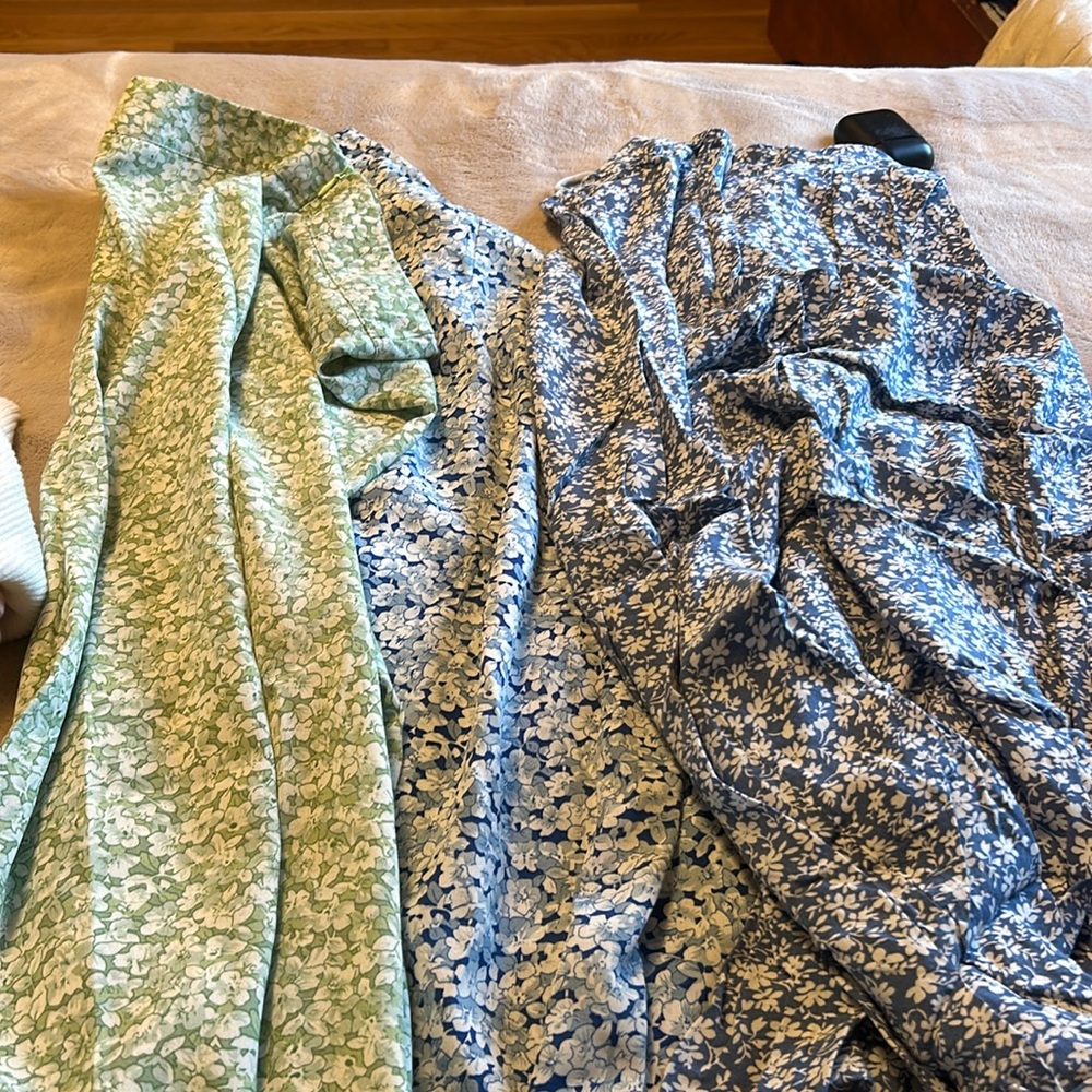 Three floral skirts, colors, blue, white and green